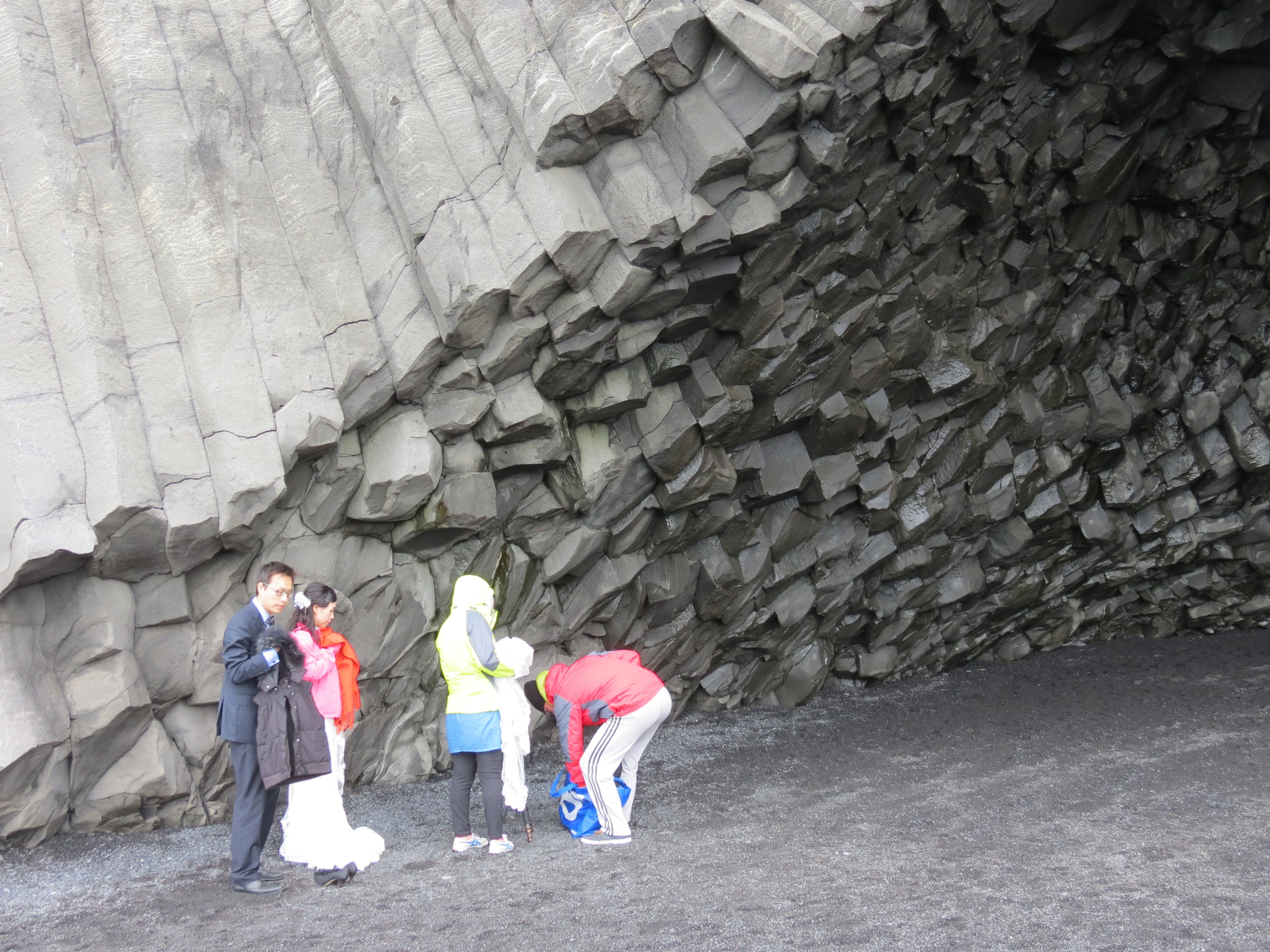 Wedding couple in basalt cave