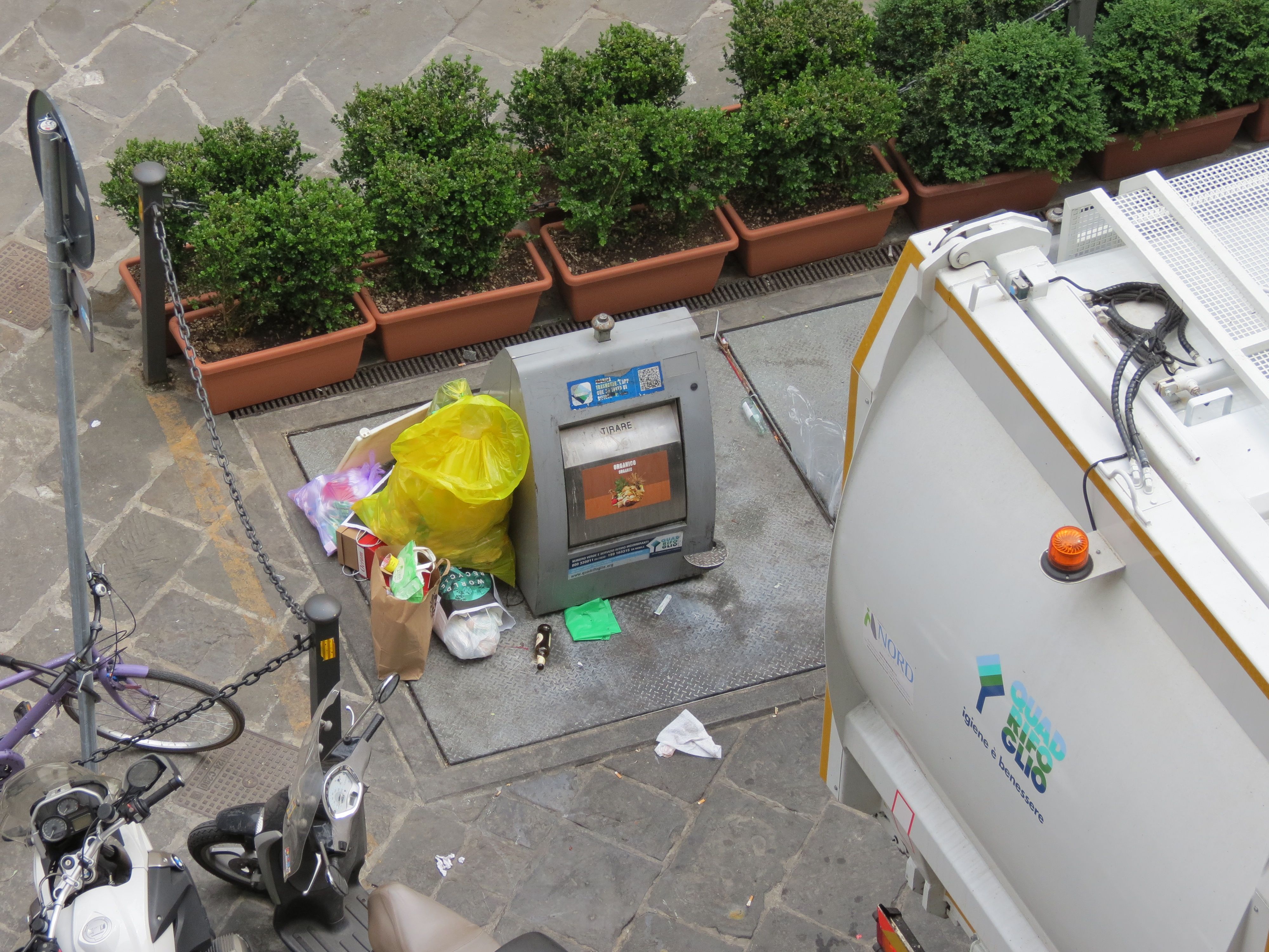 Garbage cans in repose
